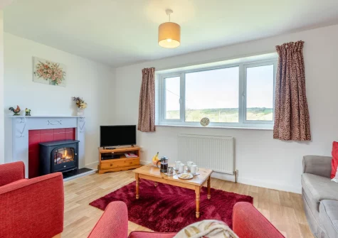 The living area at Cherry Cottage at Mettaford Farm, Hartland