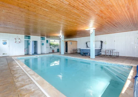The shared indoor heated swimming pool at Mettaford Farm, Hartland
