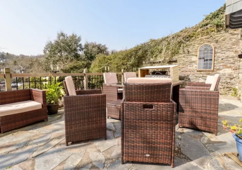 The patio & alfresco dining area at Cherry Orchard House, Mevagissey