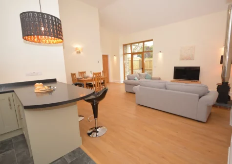 The living area & kitchen at Cherry Tree Barn, Alwington