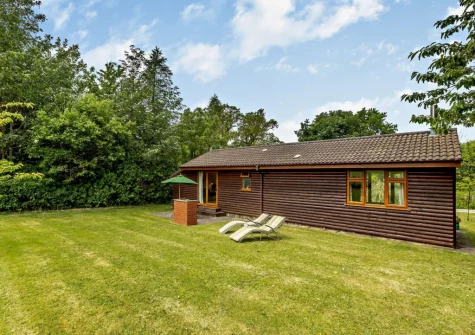 The rear patio, barbecue, alfresco dining area & garden at Cherry View, South Molton