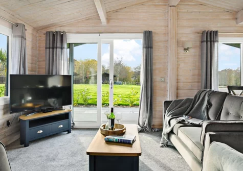 The living area at Chestnut, 6 Fingle Glen Lodges, Pathfinder Village