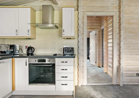 The kitchen at Chestnut, 6 Fingle Glen Lodges, Pathfinder Village