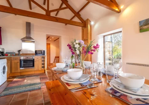 The kitchen & dining area at Church Close Cottage, Cusgarne