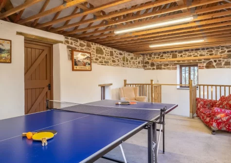 The shared games room at Church Close Cottage, Cusgarne