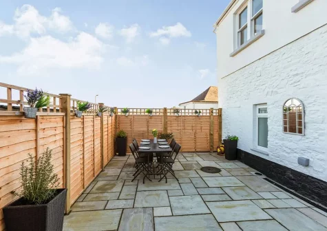 The patio & alfresco dining area at Churchfield Cottage, Appledore