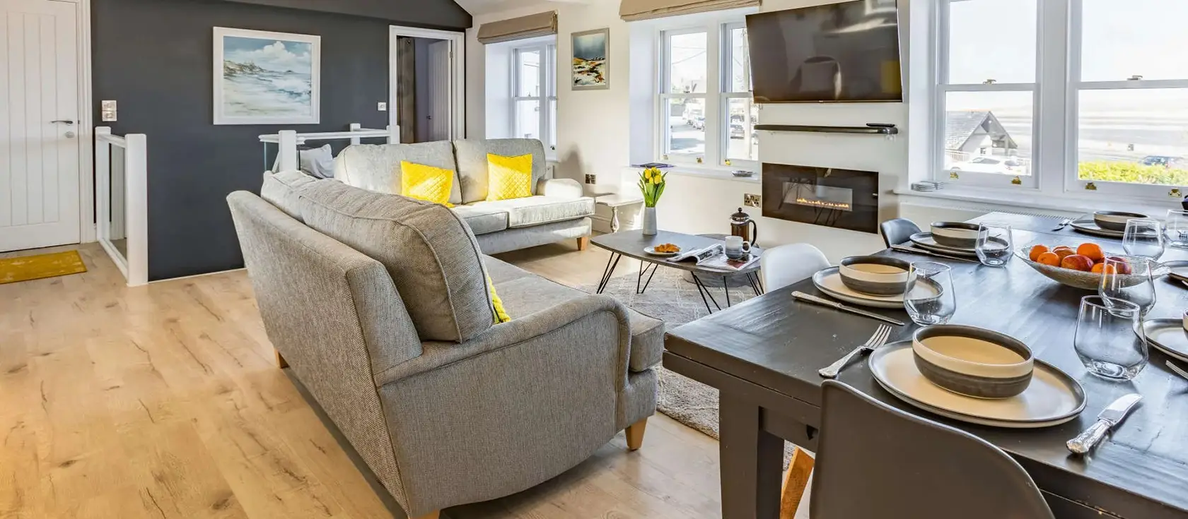 Churchfield Cottage, Appledore is a luxurious four-bedroom retreat with stunning estuary views. Enjoy reverse-level living, an enclosed patio garden, with a location close to quayside dining, maritime attractions, and charming cobbled streets.