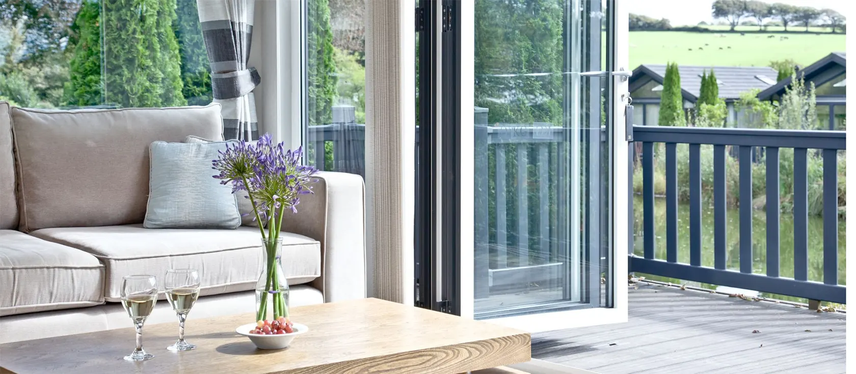 Churchill Lodge, Kentisbury Grange, Barnstaple is a luxury two bedroom two bathroom lodge with bifold doors, lake / countryside views & deck with hot tub. Furnished to a high standard with TV / entertainment centre. Onsite restaurant. Close to Exmoor.