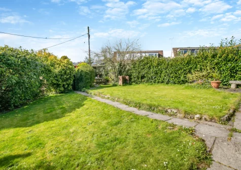 The enclosed raised garden, with barbecue & alfresco dining area, at Churchtown Cottage, Blisland