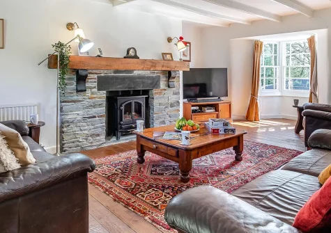 Churchtown Cottage, Blisland is a characterful 3-bedroom granite retreat with romantic four-poster charm. Explore Bodmin Moor, cycle the Camel Trail, and discover Cornwall's stunning coast. Perfect for families seeking traditional Cornish magic.