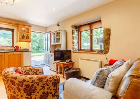 The living area at Churn Cottage, Bokiddick