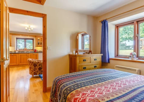The bedroom at Churn Cottage, Bokiddick