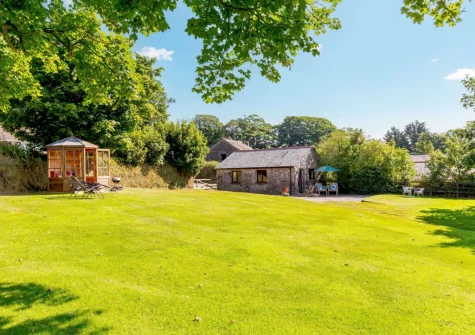 The summer house & enclosed garden at Churn Cottage, Bokiddick