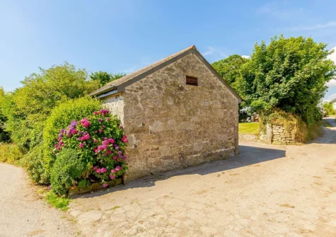 Churn Cottage is one of three pretty detached cottages situated in the quiet rural hamlet of Bokiddick
