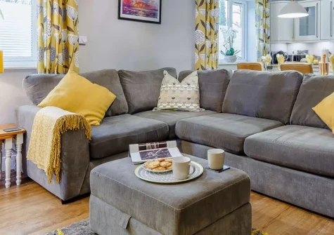 Chy Bian, Lanner is a luxurious two-bedroom cottage featuring a private hot tub, games room, and peaceful countryside setting. Perfectly positioned for exploring Cornwall's stunning coasts and attractions, ideal for memorable family holidays.