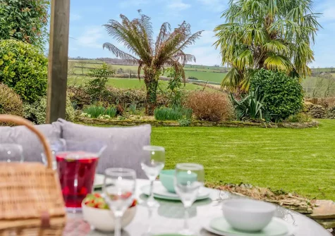 The patio & garden at Chy Kerensa, Trewidland