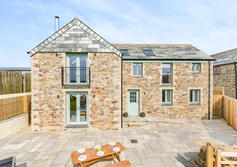 The patio, barbecue & alfresco dining area at Chy Lowen, Penvose Farm, Tregurrian