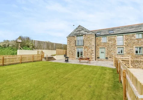 The patio & enclosed garden at Chy Lowen, Penvose Farm, Tregurrian