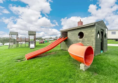 The shared children's play area at Penvose Farm, Tregurrian
