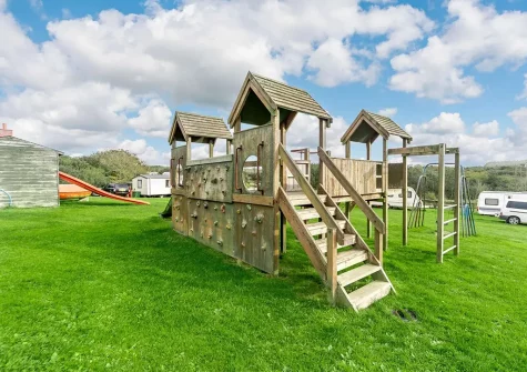 The shared children's play area at Penvose Farm, Tregurrian