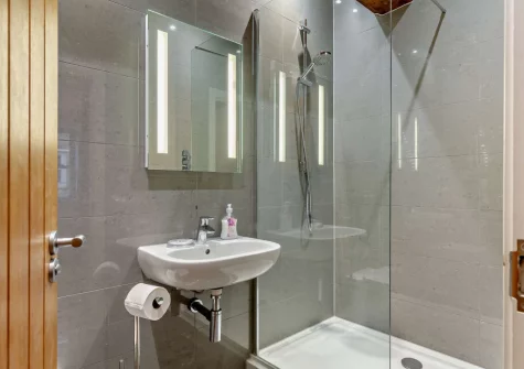 Bedroom #1 en-suite shower room at Chy Marner, Charlestown