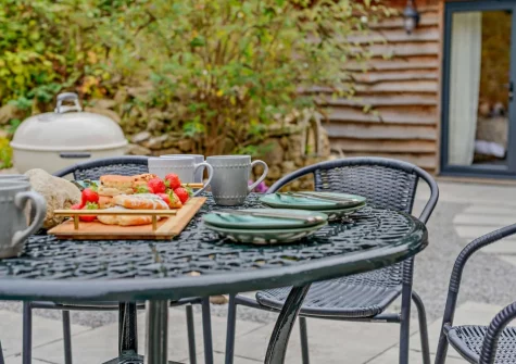 The patio, barbecue & alfresco dining area at Chyventon, Penryn