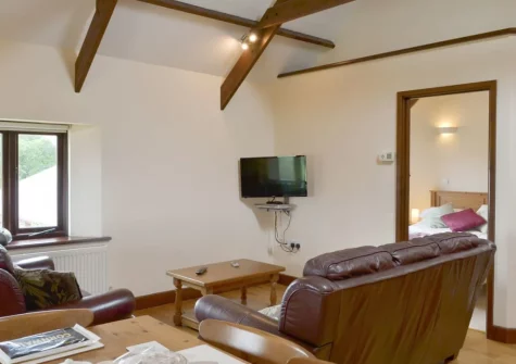 The living area at Cider Barn at Burracott Farm, Week Orchard