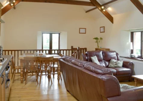 The living, dining area & kitchen at Cider Barn at Burracott Farm, Week Orchard