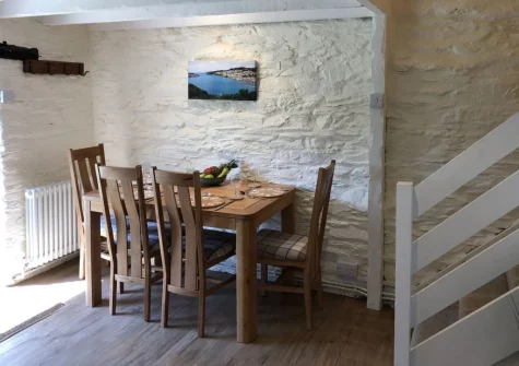 The dining area at Cider Press Cottage, Fowey