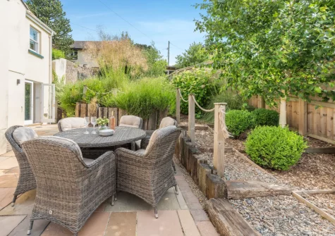 The patio, alfresco dining area & garden at Cleveland Villa, Instow