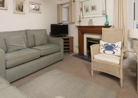 Cliff Cottage, Gorran Haven is a charming beachside retreat with stunning sea views and direct beach access. Enjoy cosy interiors, three comfortable bedrooms, and exploring Cornwall's magical treasures from this perfectly positioned haven.