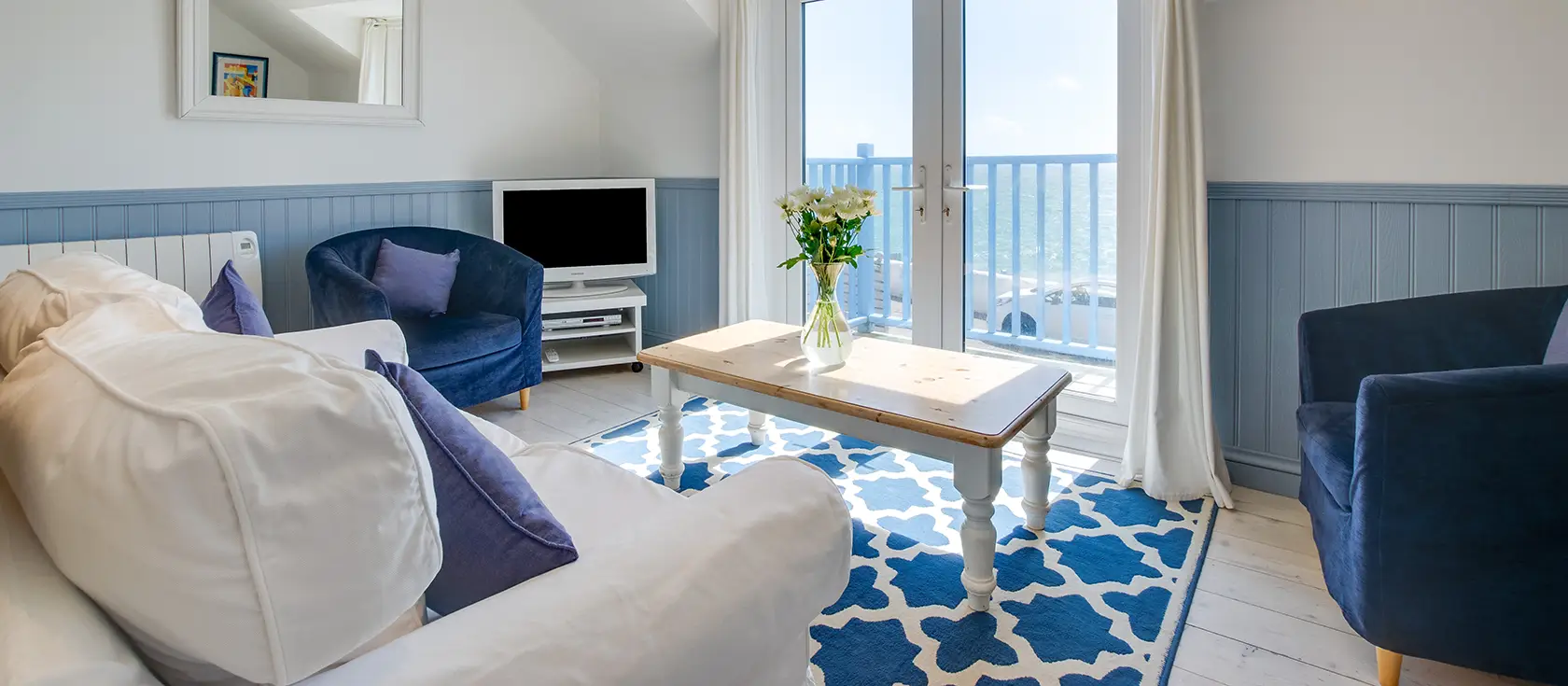 Cliff Top Cottage, Porthleven is a stylish two-bedroom seaside sanctuary with sublime sea views, New England charm, and direct access to a picturesque harbour and beach. Create cherished family memories in this enchanting coastal retreat.