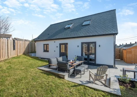 The paved terrace, barbecue, alfresco dining area & garden at Clocktower Horizon, Porthleven