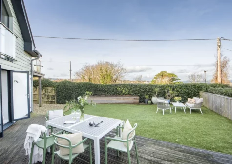 The decked patio, alfresco dining area & garden at Cloud 10, St Ives