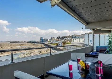 The balcony & alfresco dining area at Cloud 9, Westward Ho!