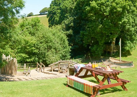One of the picnic spots & children's play area at Gitcombe House Country Cottages, Cornworthy