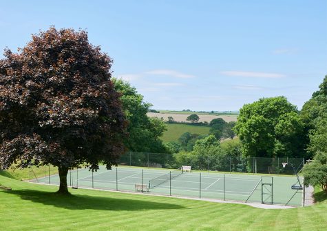 The tennis court at Gitcombe House Country Cottages, Cornworthy
