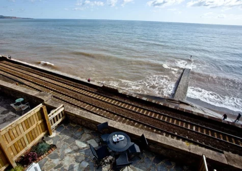 The terrace & outdoor sitting area with fantastic sea view at Coastguard Cottage, Dawlish