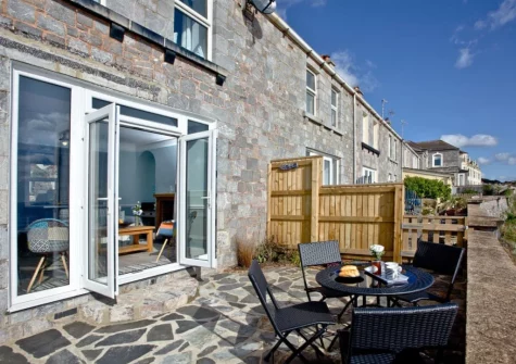 The terrace & outdoor sitting area at Coastguard Cottage, Dawlish