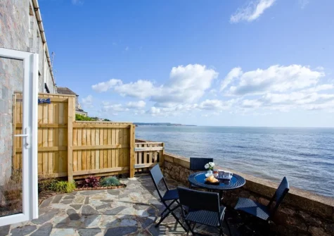 The terrace & outdoor sitting area at Coastguard Cottage, Dawlish