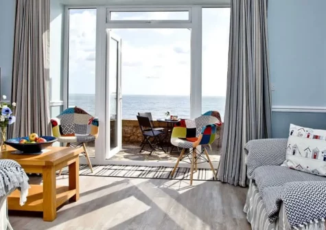 Coastguard Cottage, Dawlish is a stylish two-bedroom seaside retreat with spectacular sea views from your clifftop perch. Perfect for couples or families seeking a romantic escape with beach access, comfort, and unforgettable coastal memories.