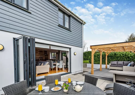 The patio & alfresco dining area at Coastguard Cottage, Woolacombe