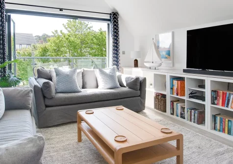 Coco Beach, Westward Ho! is a stunning 3-bedroom coastal retreat with hot tub, spectacular sea views, and beach access. Enjoy modern interiors, private patio, and North Devon's finest attractions, perfect for unforgettable family holidays.