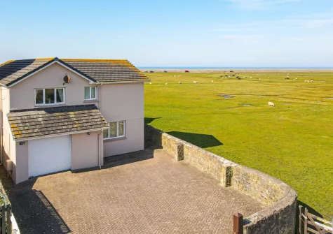 Codaro is a large detached house on the edge of Northam Burrows Country Park with stunning sea views