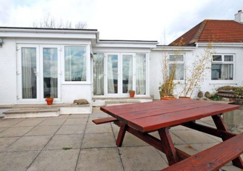 The patio area offers an ideal environment for al fresco dining