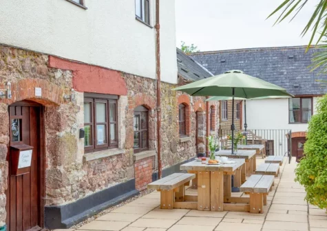 The front patio & alfresco dining area at Columbia at Ashcombe Cottages, Ashcombe