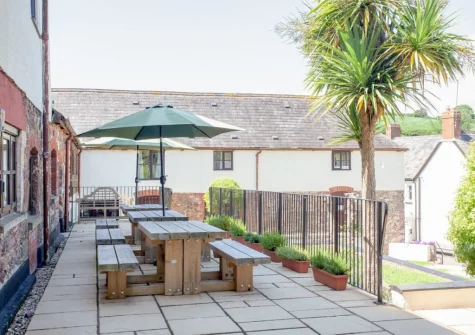 The front patio & alfresco dining area at Columbia at Ashcombe Cottages, Ashcombe