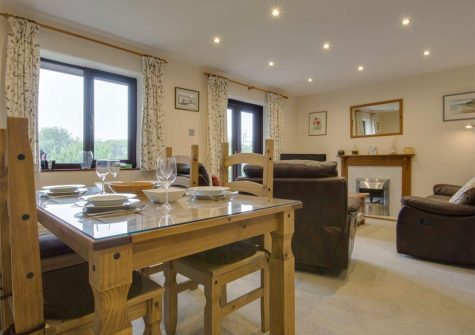 The dining area at Columbine Cottage, Poughill