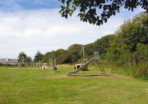 The outdoor children's play area at Columbine Cottage, Poughill