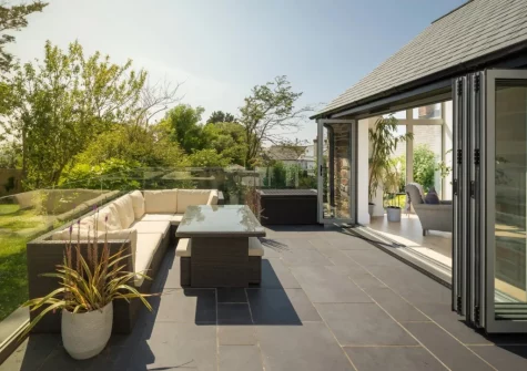 The patio terrace & alfresco dining area at Coombe Rise, Poughill